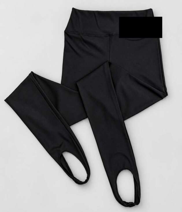 Custom black high-waist stirrup leggings produced in Istanbul for a private label activewear brand